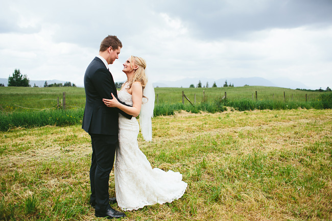 bride and groom in field BC